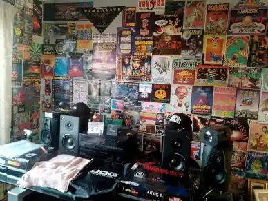 An example of a flyer wall from the 90s featuring the art of Tim Waters from the Rave Flyers / Rave Memorabilia Facebook group.