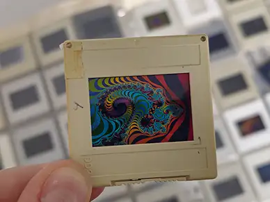 Fractal image on a photographic slide ready for postcard printing